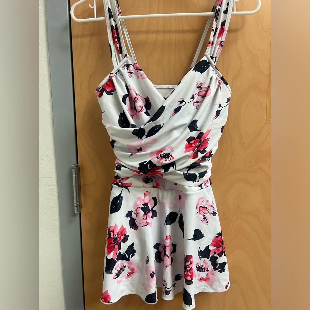 Used bathing suit. One piece. Fits like a small